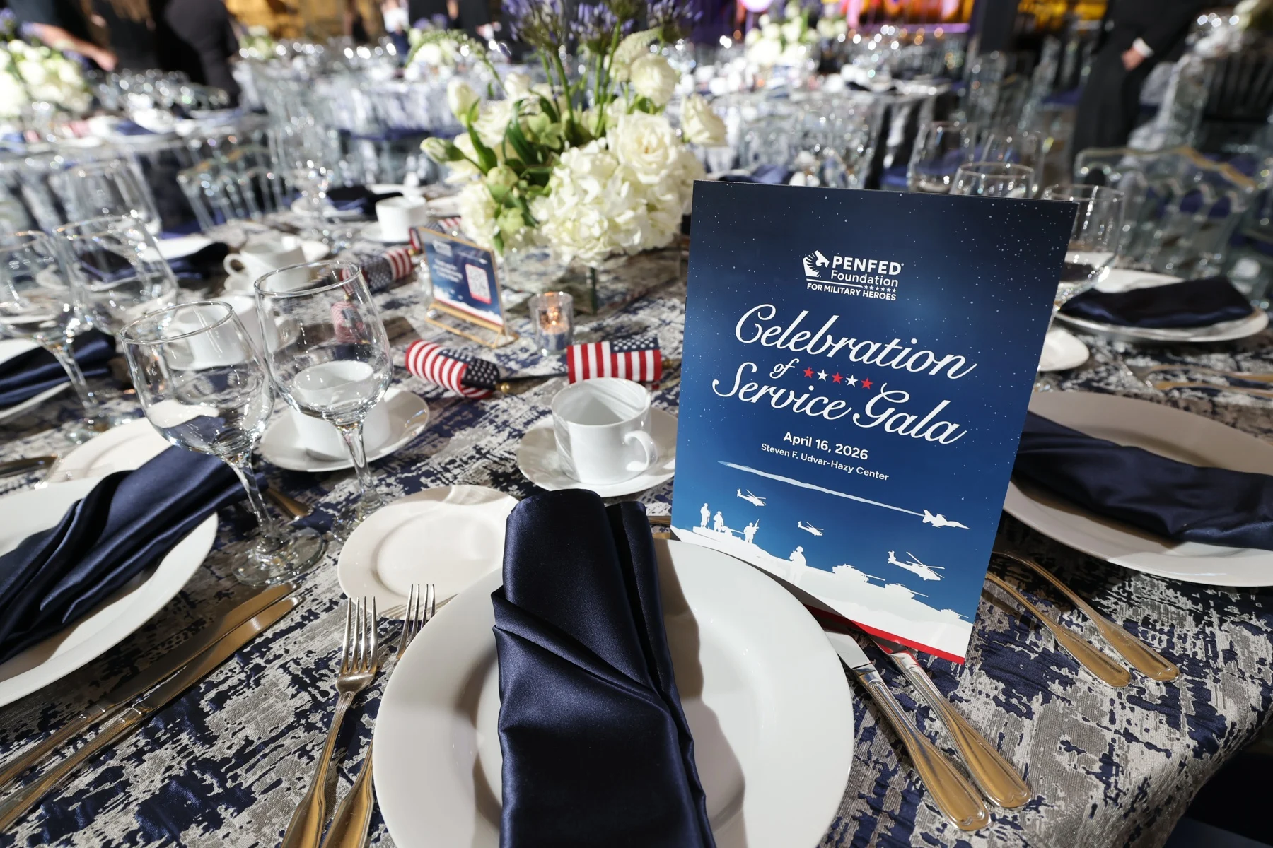 Celebration of Service Gala menu displayed at a place setting